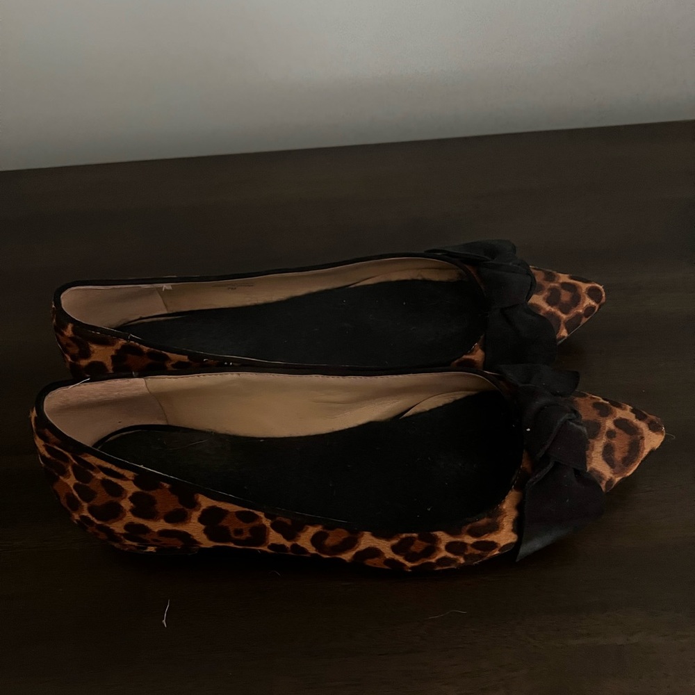 Lightly worn Ann Taylor leopard flats. Purchases a 1/2 size too small